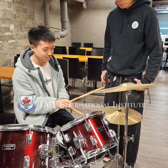 Shaping Harmonies: The TAIE Music Band